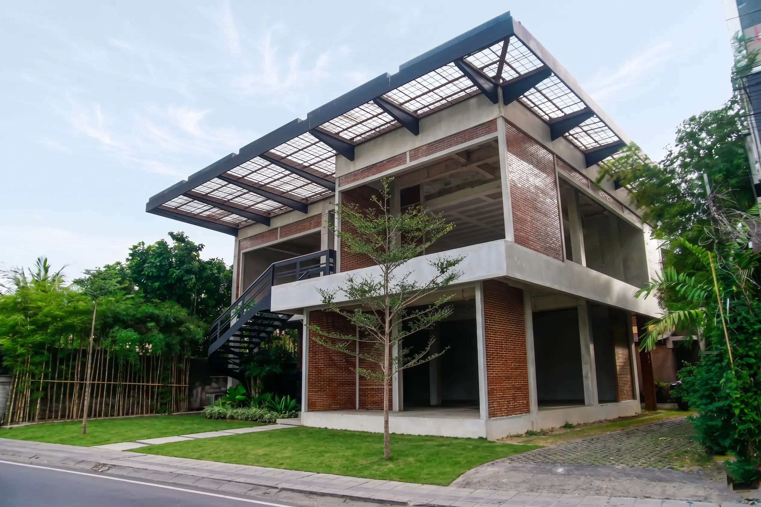 BERAWA 1053 commercial building for rent in Berawa, Canggu — modern brick-and-concrete architecture with a peaked canopy roof